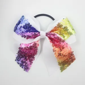 Detailed back view of sequin bow hair tie showing high-elastic black rubber band