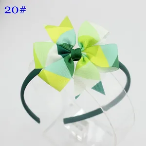 Serre-tête pour filles avec nœud en gros-grain de 8cm à motif géométrique vert