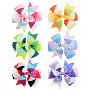 Set of 6 colorful rainbow wave pattern bow hair clips for kids with geometric print