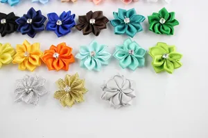 Detail of colorful DIY polyester ribbon flowers with rhinestones for clothing and jewelry