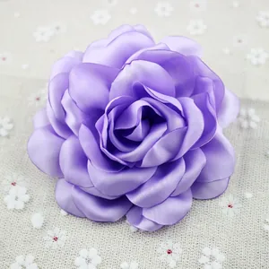 Detailed view of handmade purple chiffon peony brooch with layered silk petals
