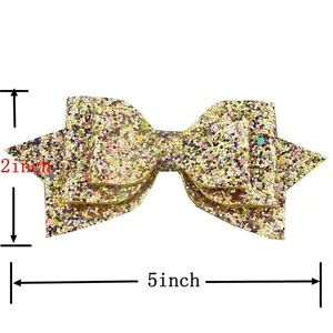 Detail view showing 5-inch gold glitter bow hair clip with dimensional measurements