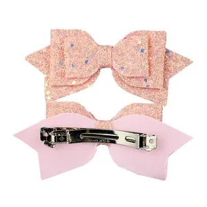 Ensemble de barrettes à nœuds pailletés roses avec pince à ressort métallique chic