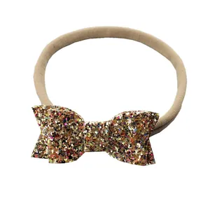Bandeau bébé en nylon kaki avec un nœud à paillettes dorées pour nouveau-né