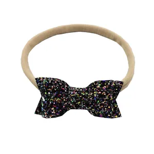 Bandeau bébé en nylon élastique kaki avec un nœud à paillettes irisées colorées