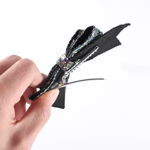 Black glitter hair clip with 5-inch sequin bow and silver metal alligator clip for women