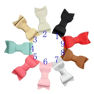 Set of 9 colorful soft faux leather bow hair clips with lychee texture for girls
