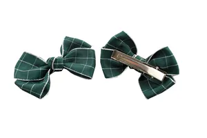 Pair of dark green plaid fabric bow hair clips for girls with metal alligator clips