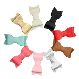 Set of 9 colorful faux leather bow hair clips with litchi texture for girls