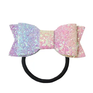 Élastique à cheveux avec nœud à paillettes dégradé violet jaune et rose brillant