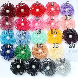 24-piece set of handmade fabric flower brooches with pearls in various vibrant colors