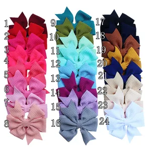 Varietà di 24 fiocchi colorati per capelli in maglia waffle per bambine in griglia