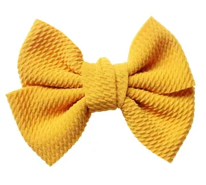 Handmade yellow textured knit bow accessory for DIY hair clips and clothing decorations