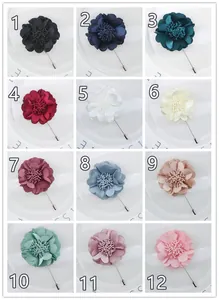 Detailed grid view of twelve elegant handmade fabric flower brooches in various colors