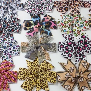 Fermagli per capelli a fiocco per bambine con stampa leopardata e cuori colorati