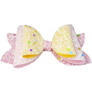 Detail of multi-layered glitter bow with pink sequins and colorful dots for DIY crafts