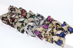 Set di sette fiocchi di paillettes da 9 cm con motivi leopardati e design glitterati colorati