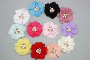 Detailed close-up of colorful 6cm chiffon flowers with faux pearl and crystal centers