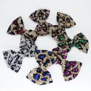 Set di sei fiocchi glitterati con stampa leopardata in vivaci colori scintillanti