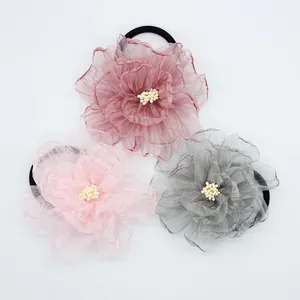 Set van drie elegante chiffon camellia bloem haarelastiekjes in zachte pastelkleuren