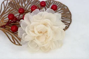Detailed macro view of the cream layered organza peony petal texture and craftsmanship