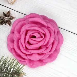 Deep pink fabric rose hair clip with layered peony petals for photography and dance