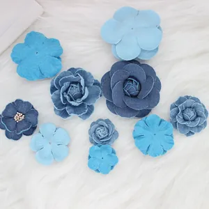 Handmade denim fabric flowers in diverse blue tones for DIY clothing and necklaces