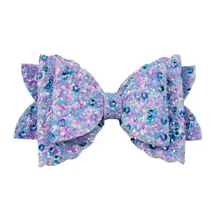 Sparkly purple glitter bow accessory for tumblers with a multi-layered sequin design