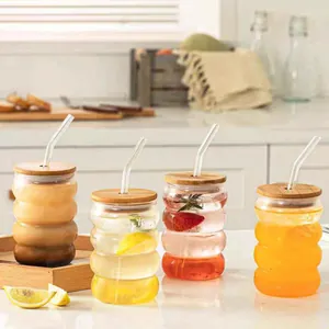 Set of 4 ribbed caterpillar glass cups with bamboo lids and glass straws for coffee