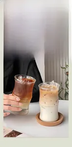 Detailed view of bamboo-shaped borosilicate glass cups with eco-friendly cork coasters