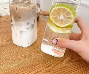 Macro shot of minimalist square glass cup showing clear texture and layering ice coffee