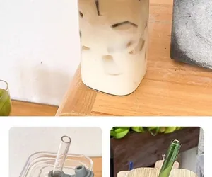 Detailed view of square glass coffee cup with matching straw and sealed leak-proof lid