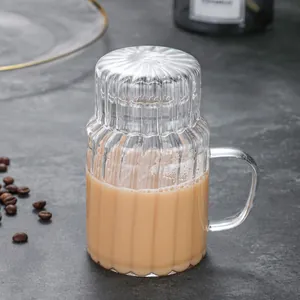 Heat resistant fluted glass cup with lid and handle for home tea or coffee use