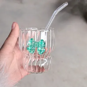 Vintage style striped glass tumbler with a green plaid bow and glass straw for girls