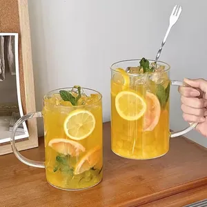 Large 1000ml glass tea cups with handles, lemon fruit tea and long metal stirring spoon