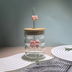 Modern wavy glass cup with bamboo lid, glass straw and pink 3D bow decorations