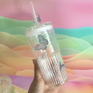Detailed view of the butterfly glass cup with hammered texture and straight vertical ridges