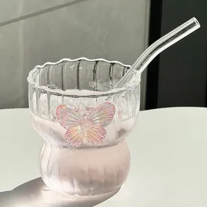 Elegant ripple textured glass coffee cup with 3D iridescent butterfly and straw