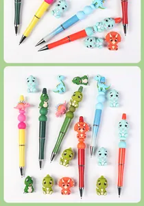 Detailed view of colorful 3D silicone dinosaur beads and cartoon pens for DIY bracelets