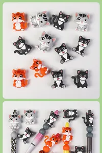 Detailed view of DIY bead pen featuring cute 3D silicone cartoon cat beads in three colors
