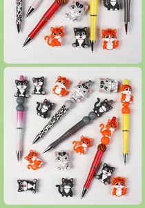 Detail of colorful DIY bead pens featuring cute 3D cartoon silicone cat characters