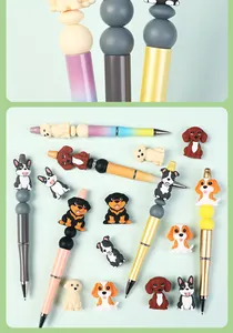 Detail of DIY beaded ballpoint pens with cute 3D cartoon dog charms and colorful beads