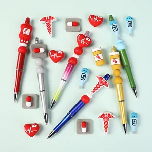 DIY medical theme bead pens with silicone charms including heart, rx bottle and caduceus