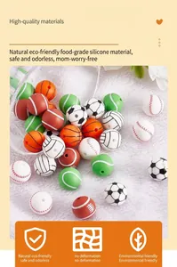 Detailed view of 15mm sports theme silicone beads with football and basketball patterns