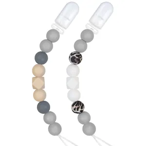 Lot de deux attaches-tétines en silicone avec perles léopard et clips de sécurité