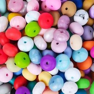 Bulk 14mm abacus-shaped food-grade silicone beads in various macaron and marble colors