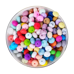 Colorful 14mm food-grade silicone abacus beads for DIY jewelry making in a white bowl