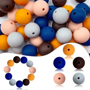 Detailed view of colorful round silicone beads for DIY jewelry and teething necklaces
