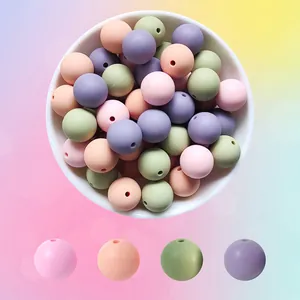 40 Stück 15mm bunte Silikonperlen in einer Schale für DIY Schmuck und Bastelarbeiten