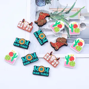 Western style PVC shoe charms set featuring cowboy boots and cactus for clogs